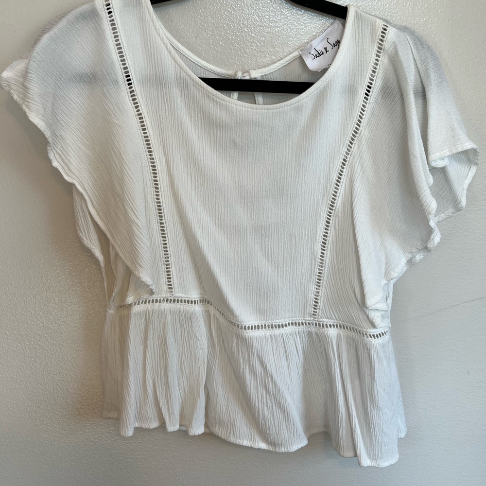 White flowery top